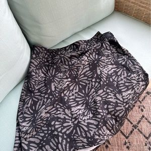 Black and gray batik print Rip Skirt Hawaii with matching neck scarf.